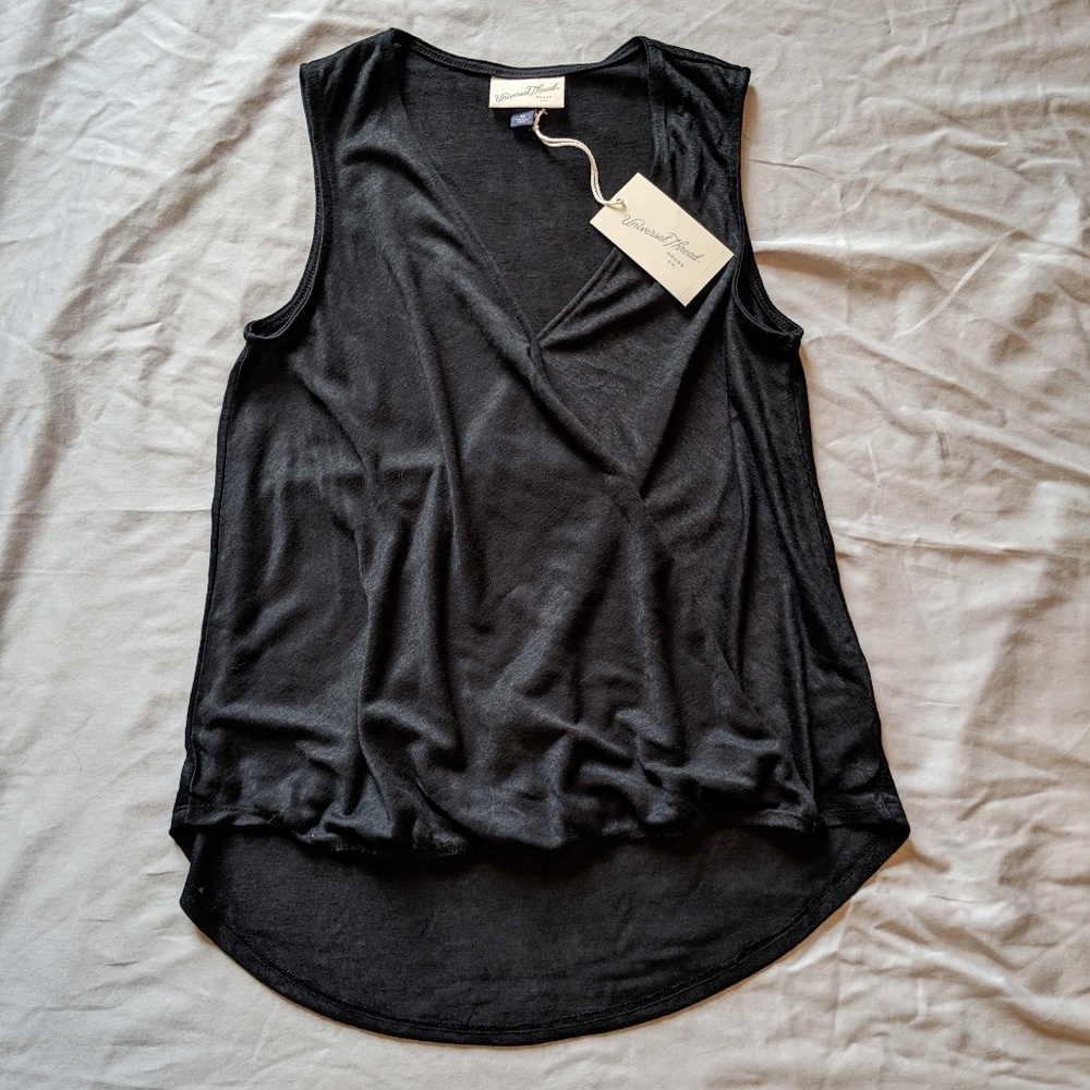 Universal  thread cross from high low hem tank